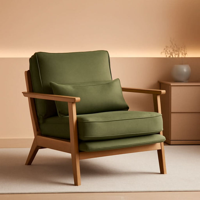 Sillón mid-century verde salvia con cojín lumbar, en ambiente Casa Nuvé