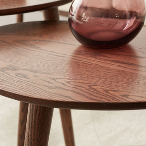 Alder oval side table in solid oak with a warm walnut finish